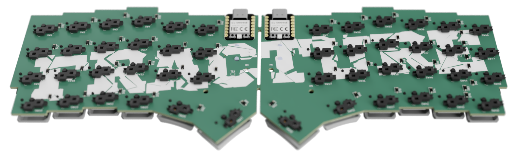 Rear view of both Fracture split-keyboard PCB halves joined at the center.