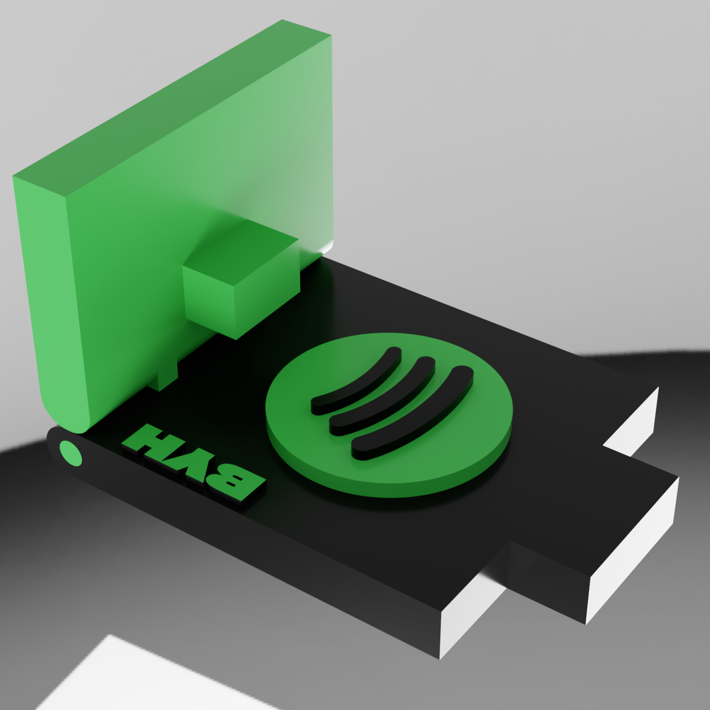 3D render of the Spotube enclosure with green side panels and a black top control surface.